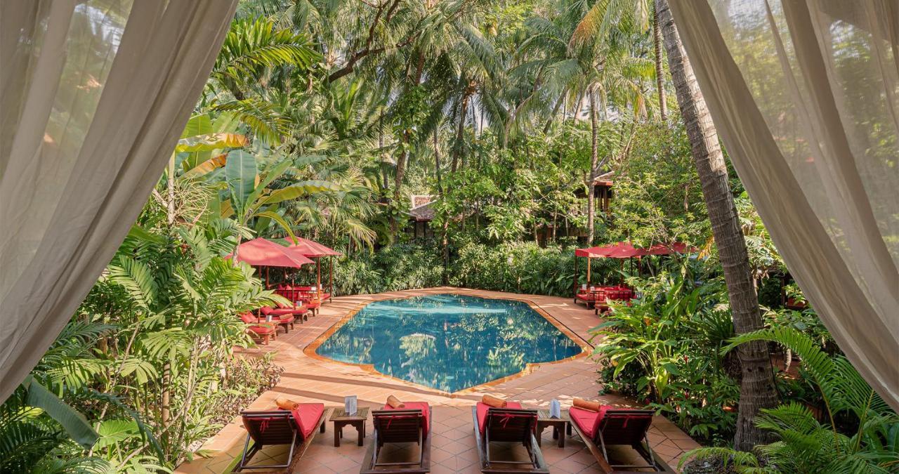 Angkor Village Hotel Siem Reap Eksteriør bilde The pool at the hotel